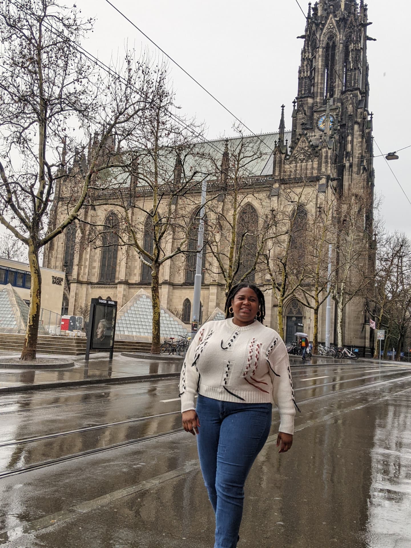 Diedre walking through Basel, Switzerland on a rainy day